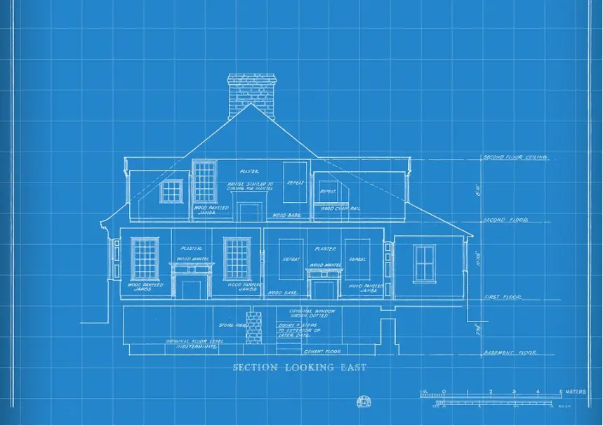 A detailed blue blueprint of a home.