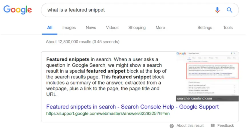 A Google search for the term “what is a featured snippet” depicting a featured snippet.
